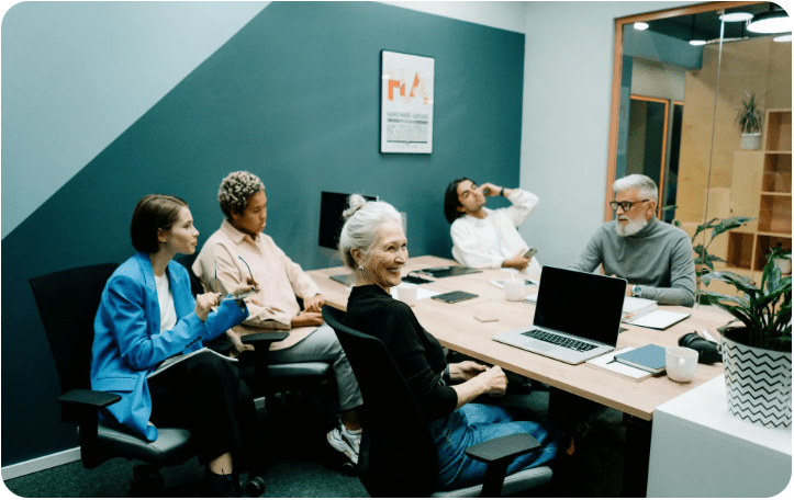 Team discussing ideas around a table