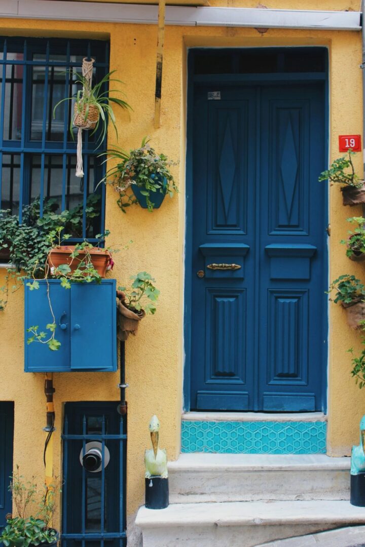 Blue door on a yellow wall